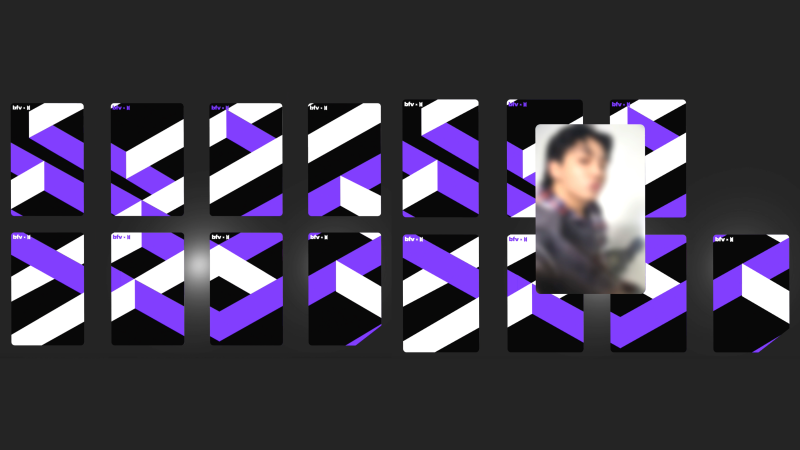 photocard backings with intersecting purple and white stripes; blurred photocard of Jungkook