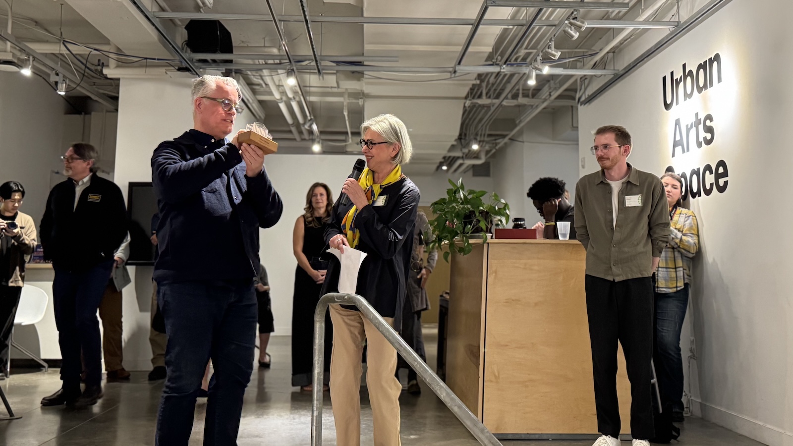 Thomas receiving award.