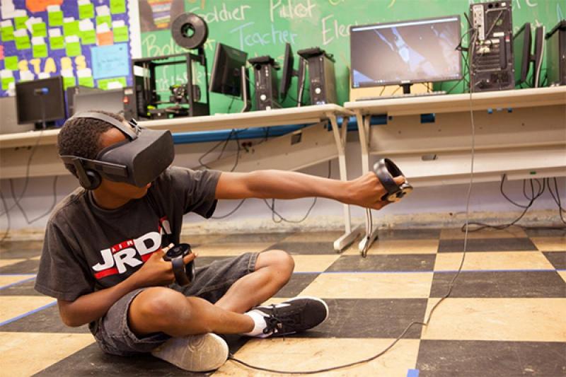 Image of child wearing virtual reality goggles
