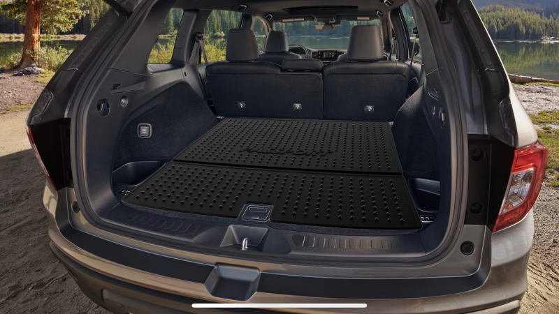 The last image number 6 is a Photoshoped image of the 3D rendering of the mat inside the Honda Passport for reference. The trunk is open showcasing how deep it is which is why this design was created (more information is listed within other materials for this project).