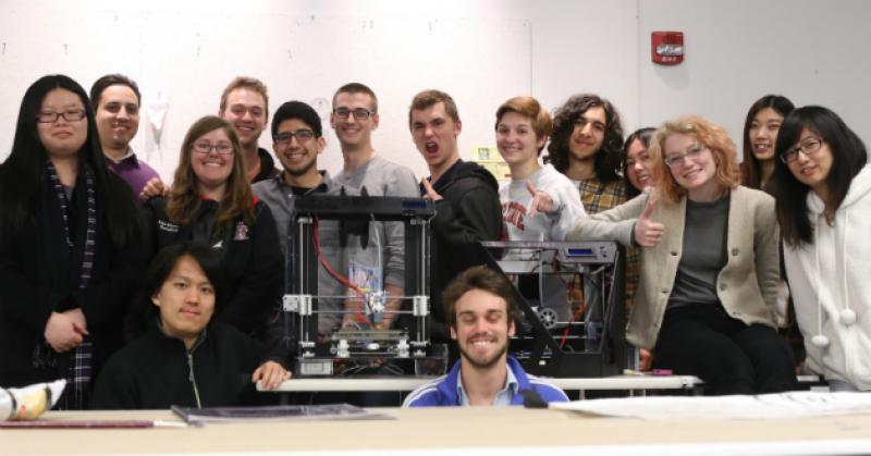Industrial Design students pose with their 3D printers.