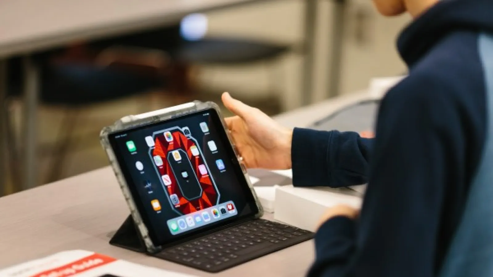 iPad displaying Anne Knellinger’s wallpaper image.