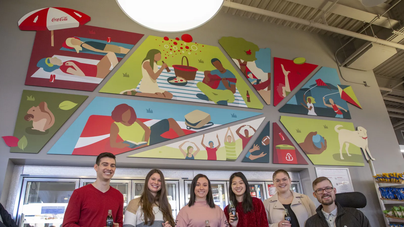 1.	Image of 6 students underneath the mural
