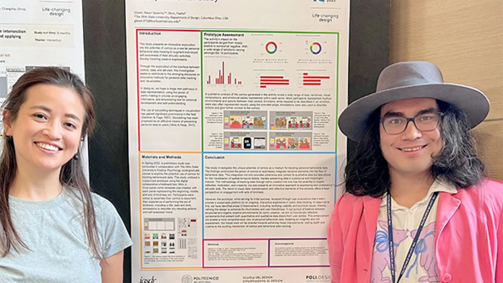 Yvette Shen and Raven Glover standing near the research poster