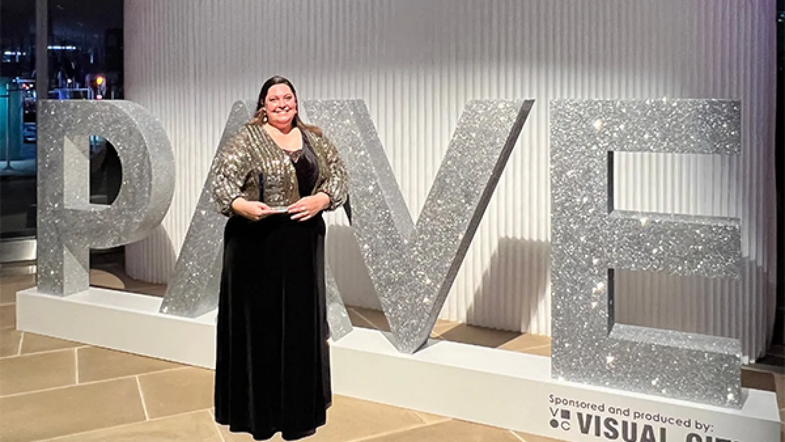Rebekah Matheny photographed with the 2023 PAVE Award