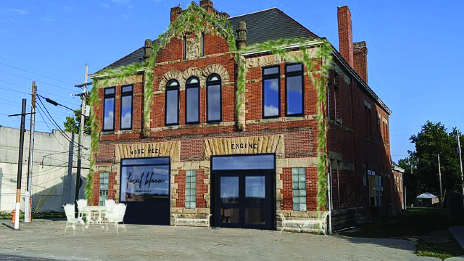 Local Bloom is located in the historic Engine House no. 6, a two-story, red brick building on W Broad Street. The facade is shown with an updated, black-framed glass entrance and a large storefront window with the Local Bloom logo on it. 