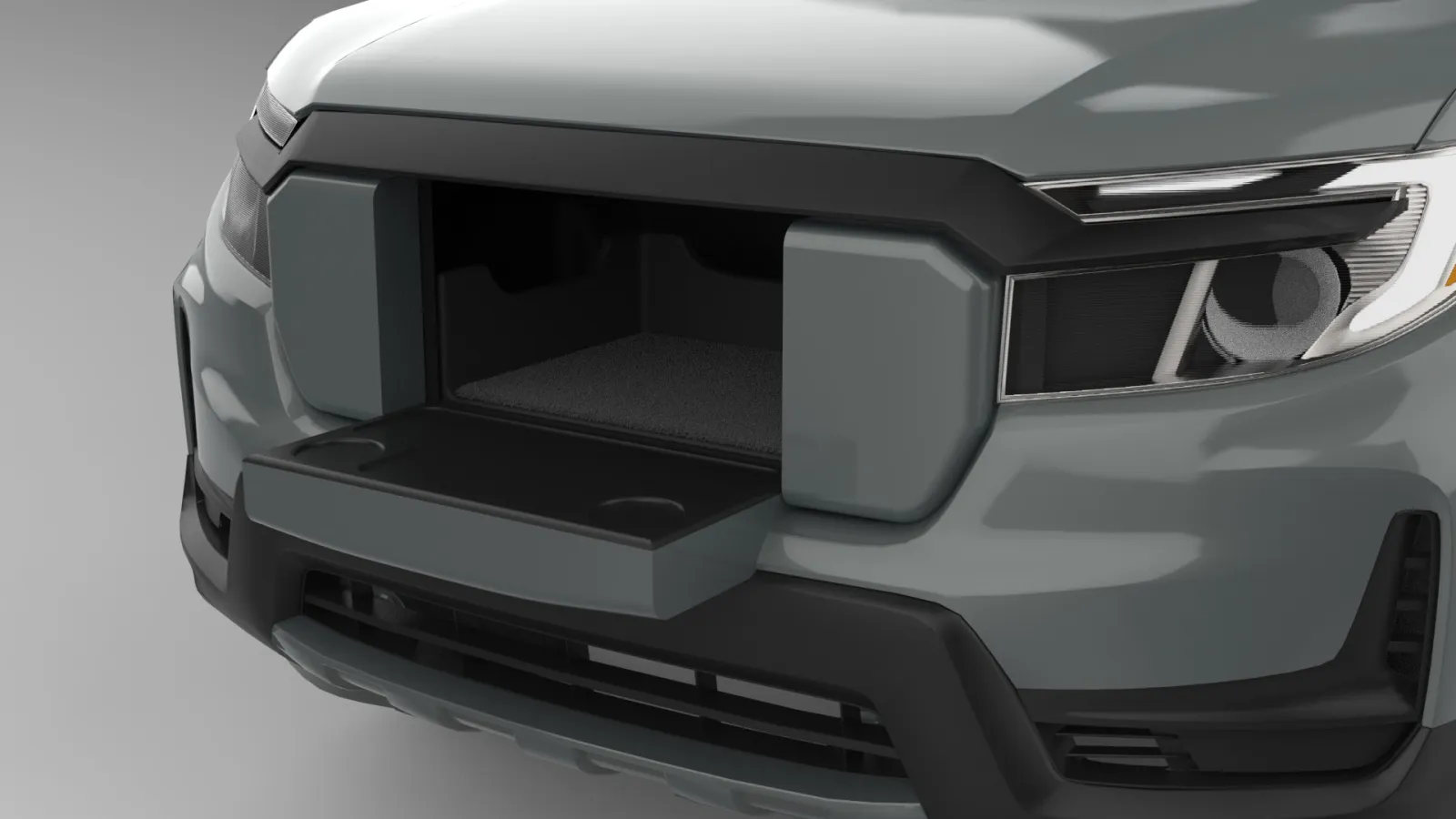 A 3D rendered image of the front of a Honda Ridgeline with the center part of the grille (the Grille Guard) being completely lowered and flush with the bed of the frunk. The hood is still lowered in place.
