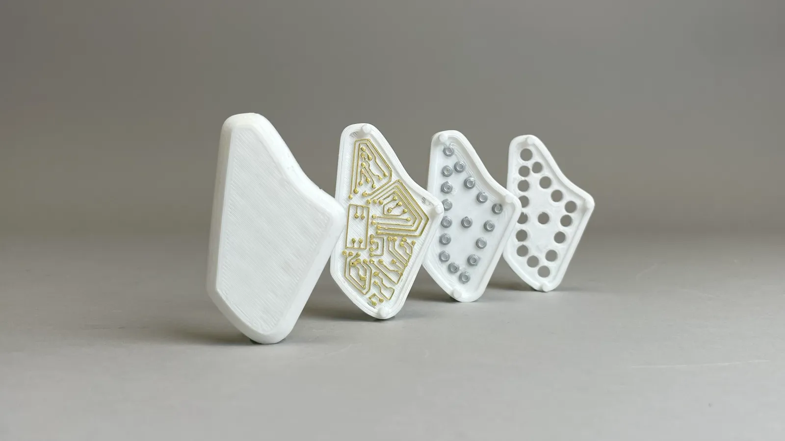 Photograph of 3D printed implant model with components displayed