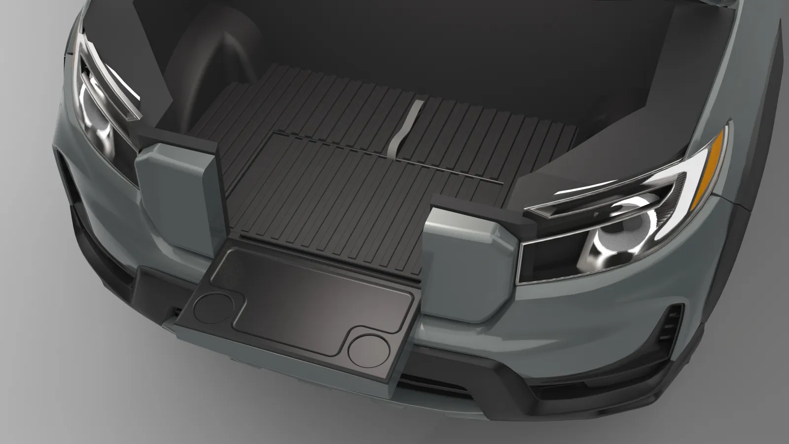 A 3D rendered image of the front of a Honda Ridgeline from a top down view with no hood showing the entire frunk with the gait down and the guard flipped over to be flush with the rest of the frunk bed. The pattern on the frunk bed all aligns over top of the guard. The pull belt is hanging off the back edge of the guard towards the back of the frunk.  