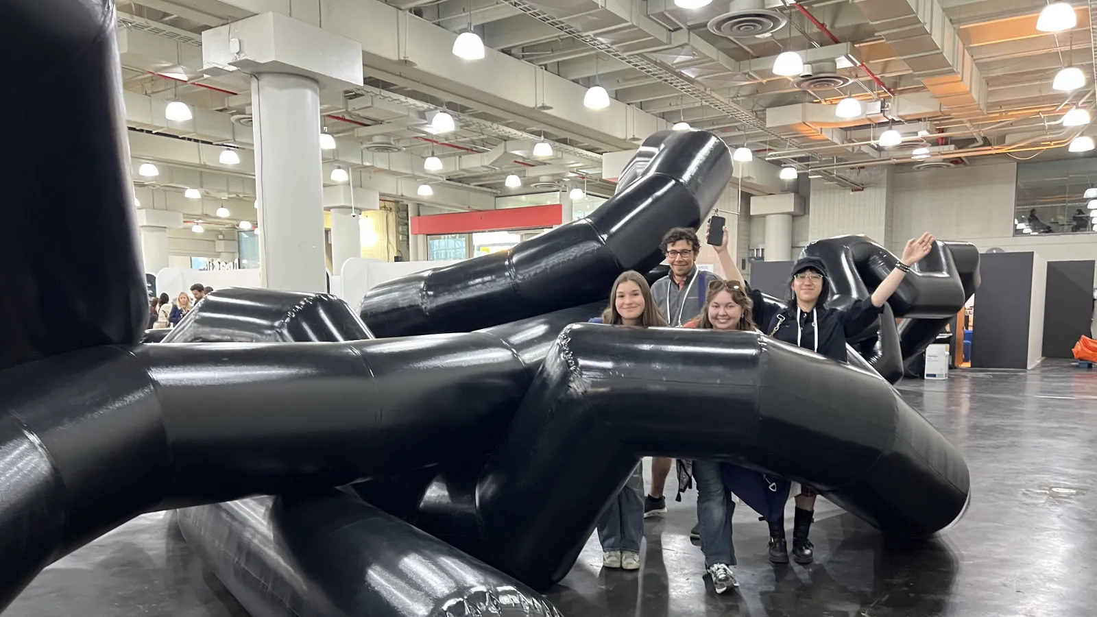 Students among an exhibition 