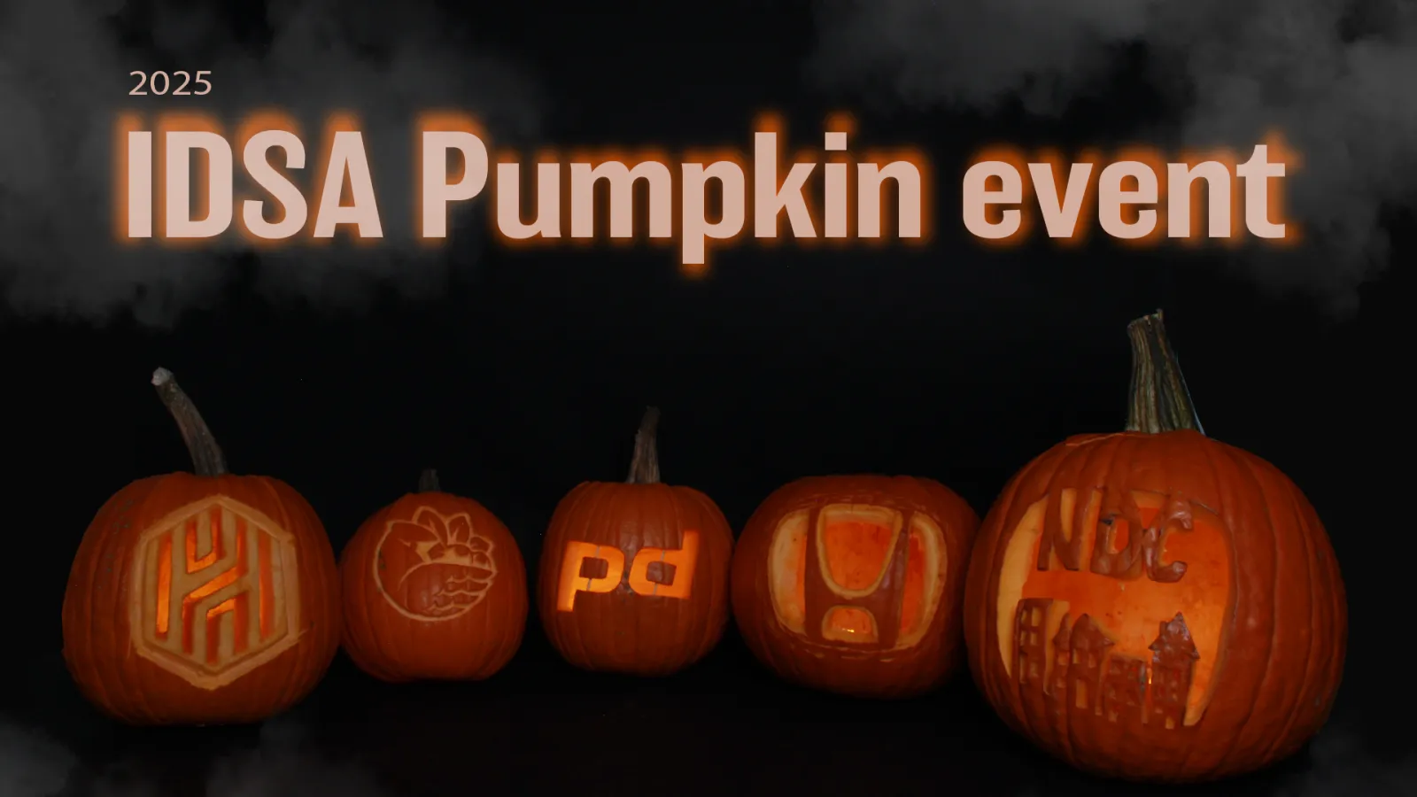 Photo of 5 pumpkins carved for the judges and sponsor companies.
