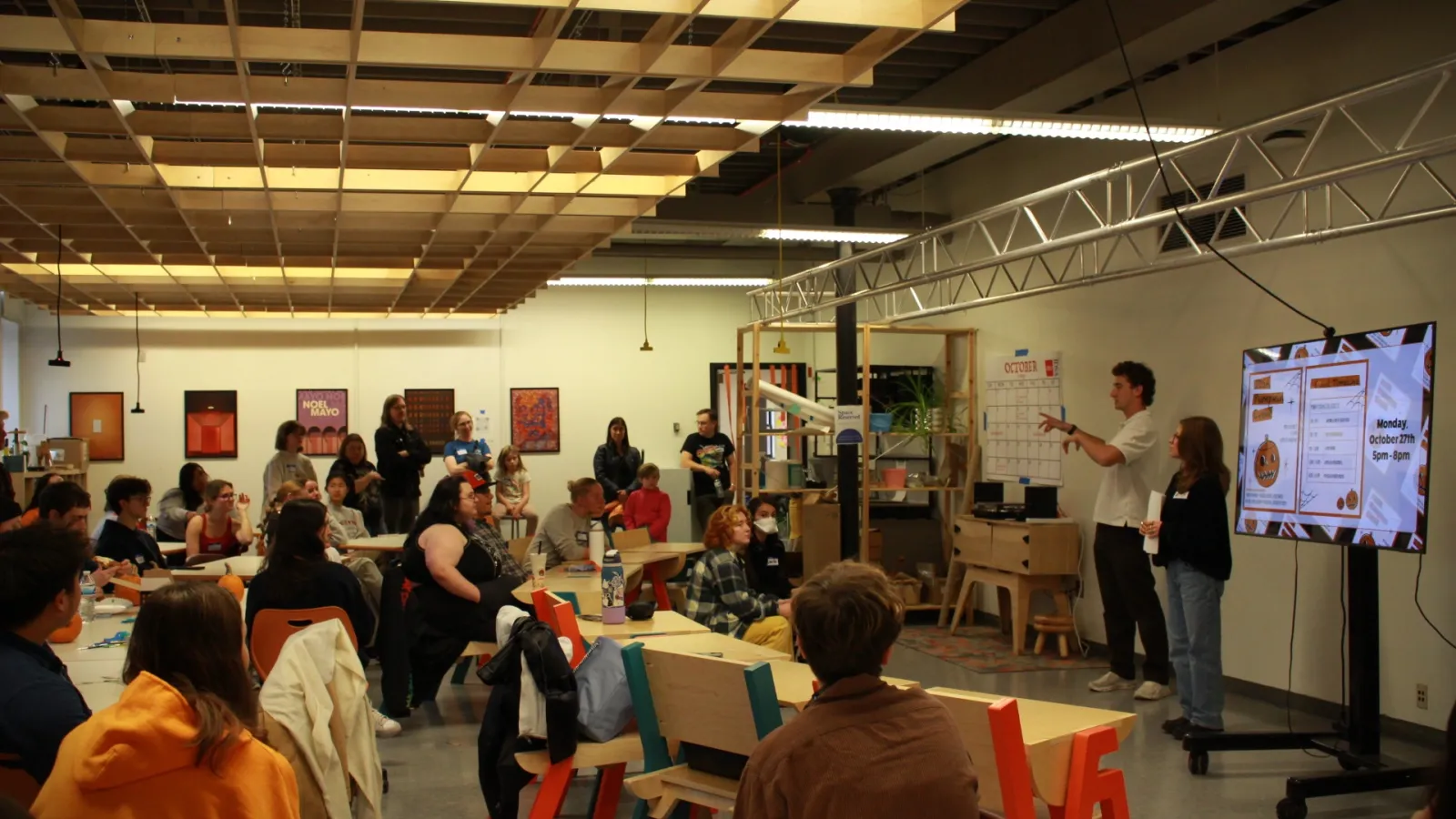 Photo of Anya and Will addressing the participants. 