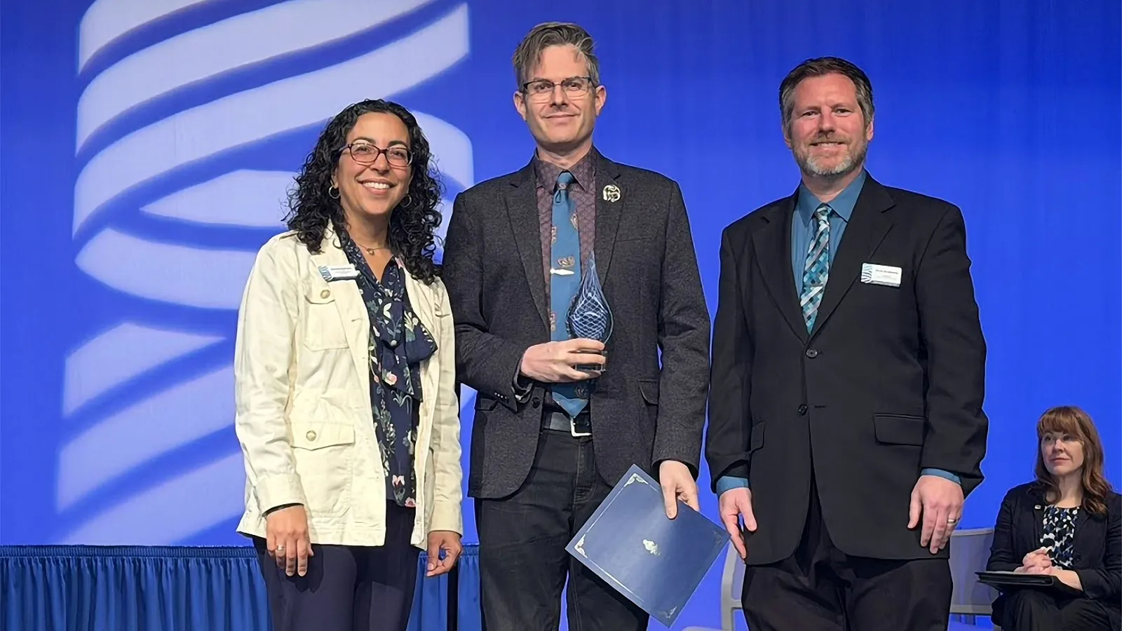  Erik Evensen being recognized with the Outstanding Research Mentor award at the University of Wisconsin–Stout.