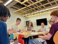 Students collaborating around a table