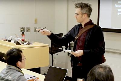 Erik Evenson teaching in a classroom