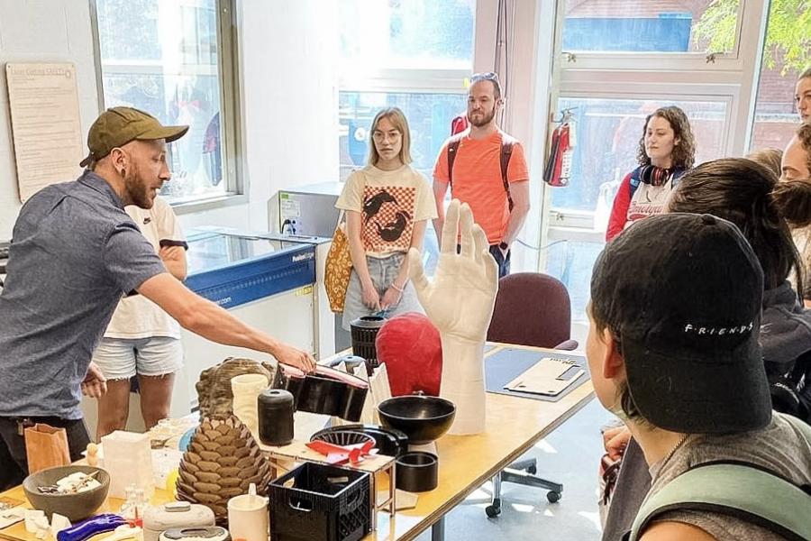 Josh with students in the Digital Fabrication Lab