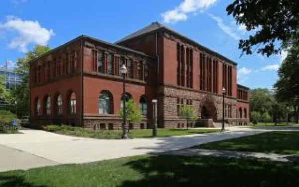 Worms eye view of Hayes Hall exterior on a beautiful summer day.