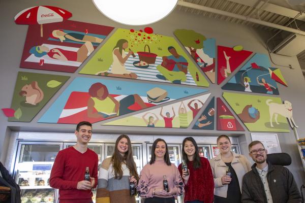 1.	Image of 6 students underneath the mural