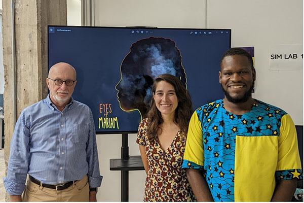 Standing left to right, Mario Peruggia, Deborah Kunkel, and Shadrick Addy