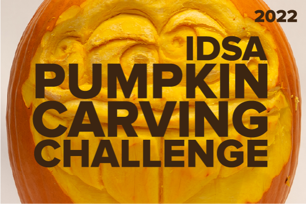“2022 IDSA Pumpkin Carving Challenge” over a photo of a face carved into a pumpkin.