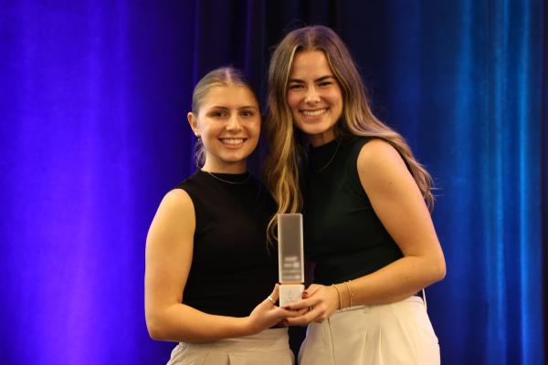 Brooke Koch and Averi Wolf accepting their IIDA Student Project of the Year Award.