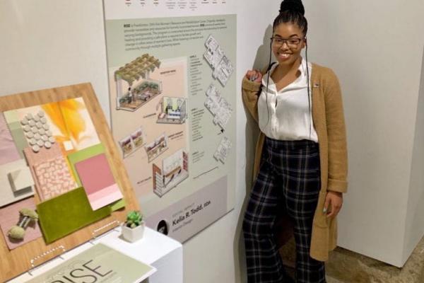 Kelia Todd standing next to her thesis project which won Best in Show for the interior design segment of the Department of Design Spring Exhibition 2019 show. Credit: Courtesy of Kelia Todd