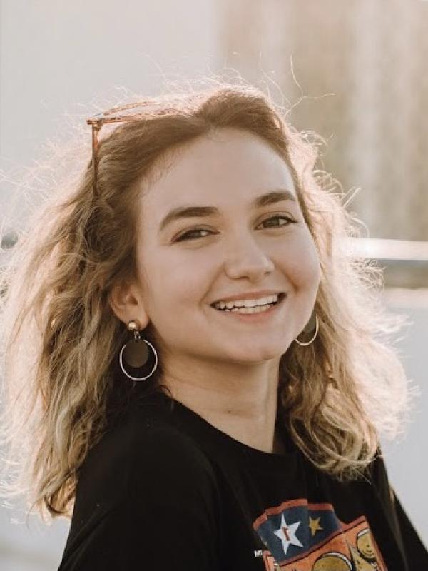 Girl smiling and looking at the camera