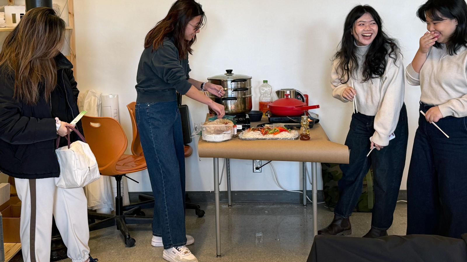 students eating hotpot