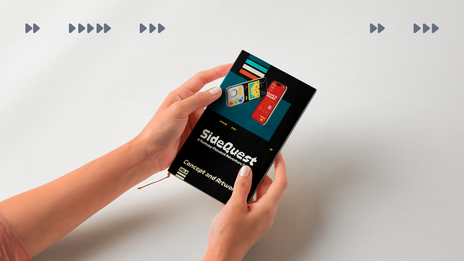 Hand holding a printed manual with SideQuest branding
