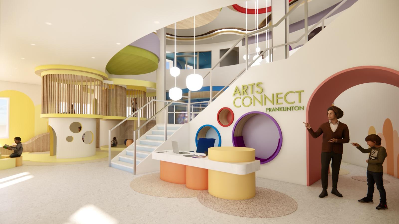 The lobby features a spacious, bright area with a large reception desk and natural light pouring in through windows. The space is designed to create a welcoming, vibrant environment, with bold colors and open areas for movement.