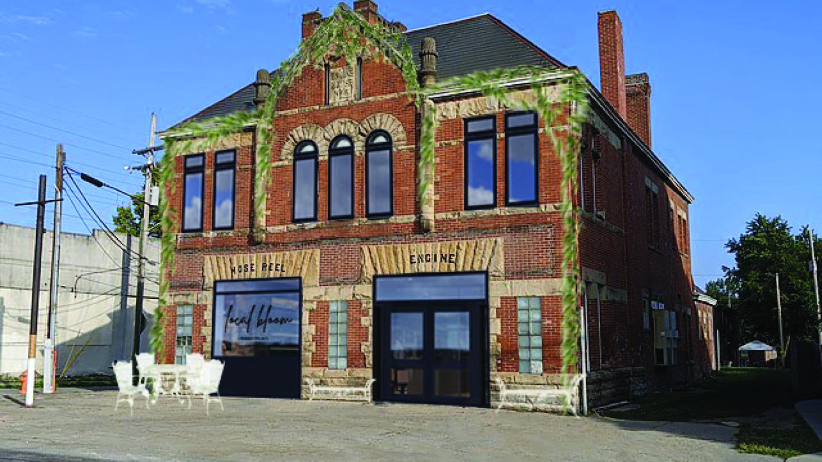 Local Bloom is located in the historic Engine House no. 6, a two-story, red brick building on W Broad Street. The facade is shown with an updated, black-framed glass entrance and a large storefront window with the Local Bloom logo on it. 