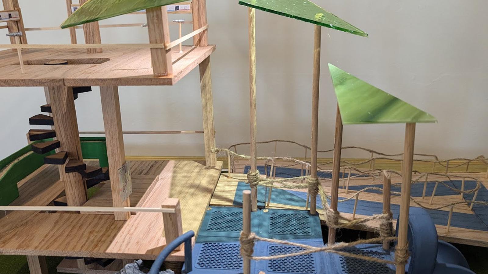 This is another view of the rock house. It instead focuses on showing how the light moves through the stained glass. It creates a patterned effect that looks like leaves interlaced in the sunbeams.
