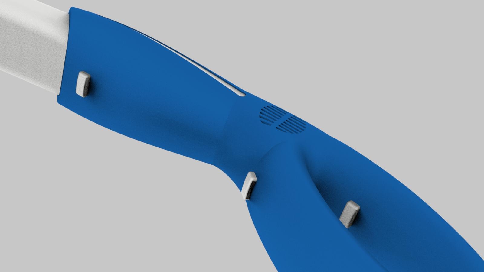 A close-up of one of the three safety release buttons on the OSI applicator handle, which allows for easy activation with a simple press.