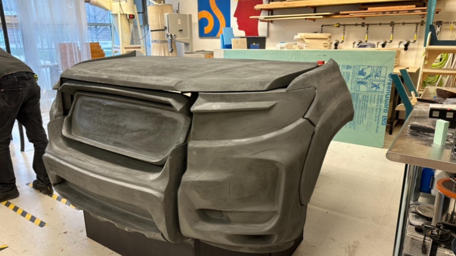A three-quarter angle of the same truck model, this time with the hood closed and the grille put in place.