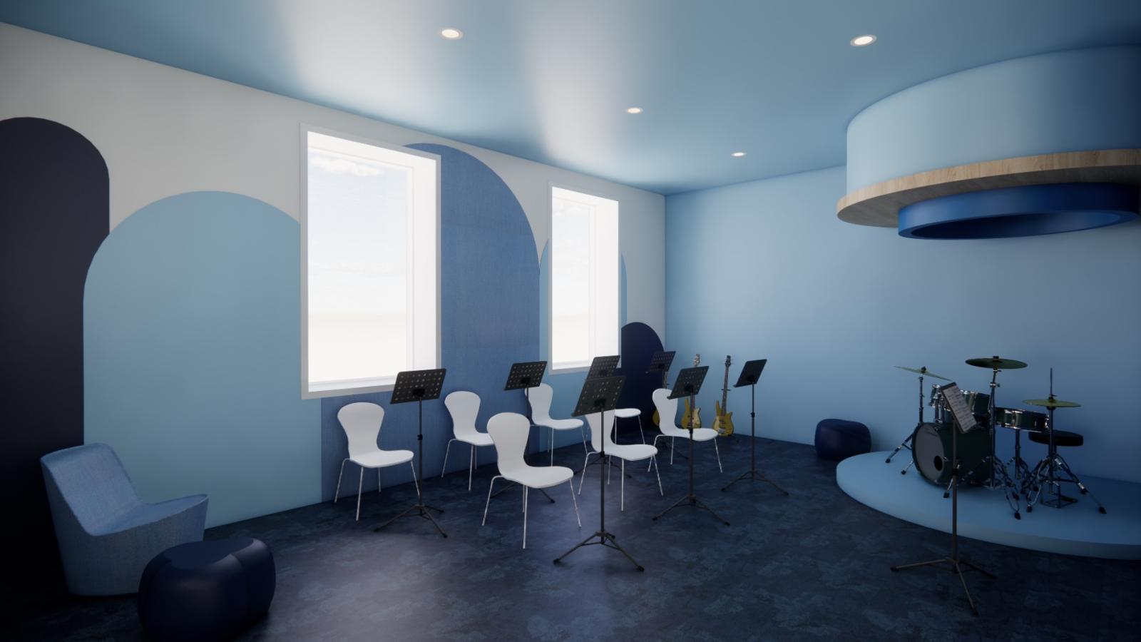 The music room is a calm, blue-toned space equipped with instruments and seating for group music activities. The design promotes focus and collaboration in a creative setting.