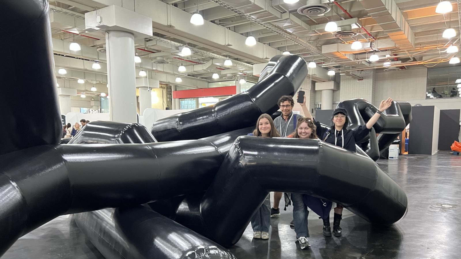 Students among an exhibition 