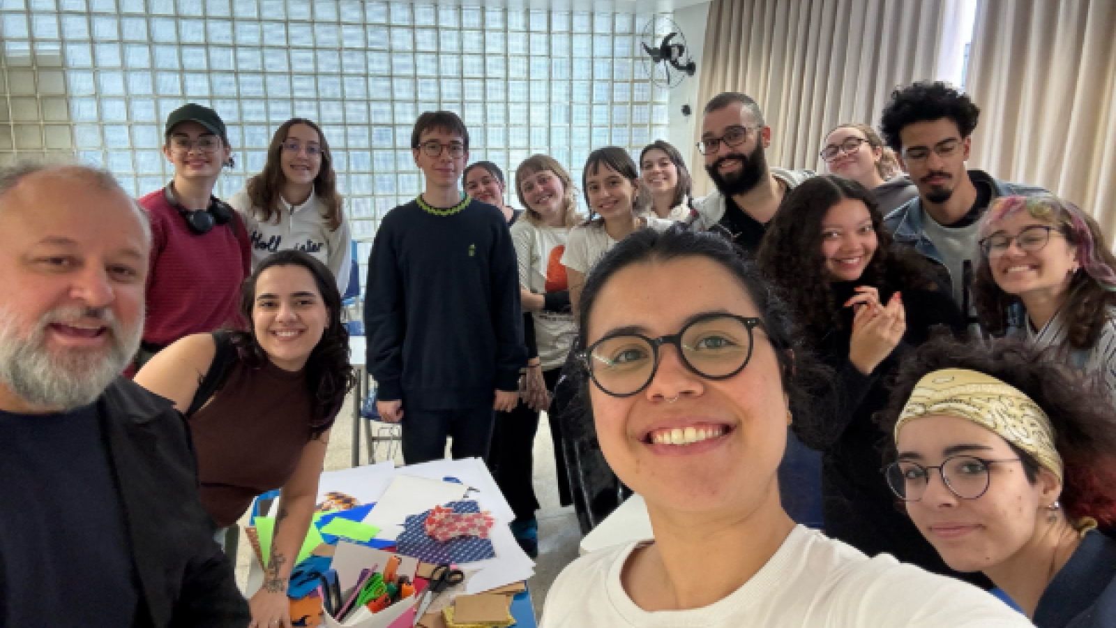 Barbara smiling with a group of people in Brazil